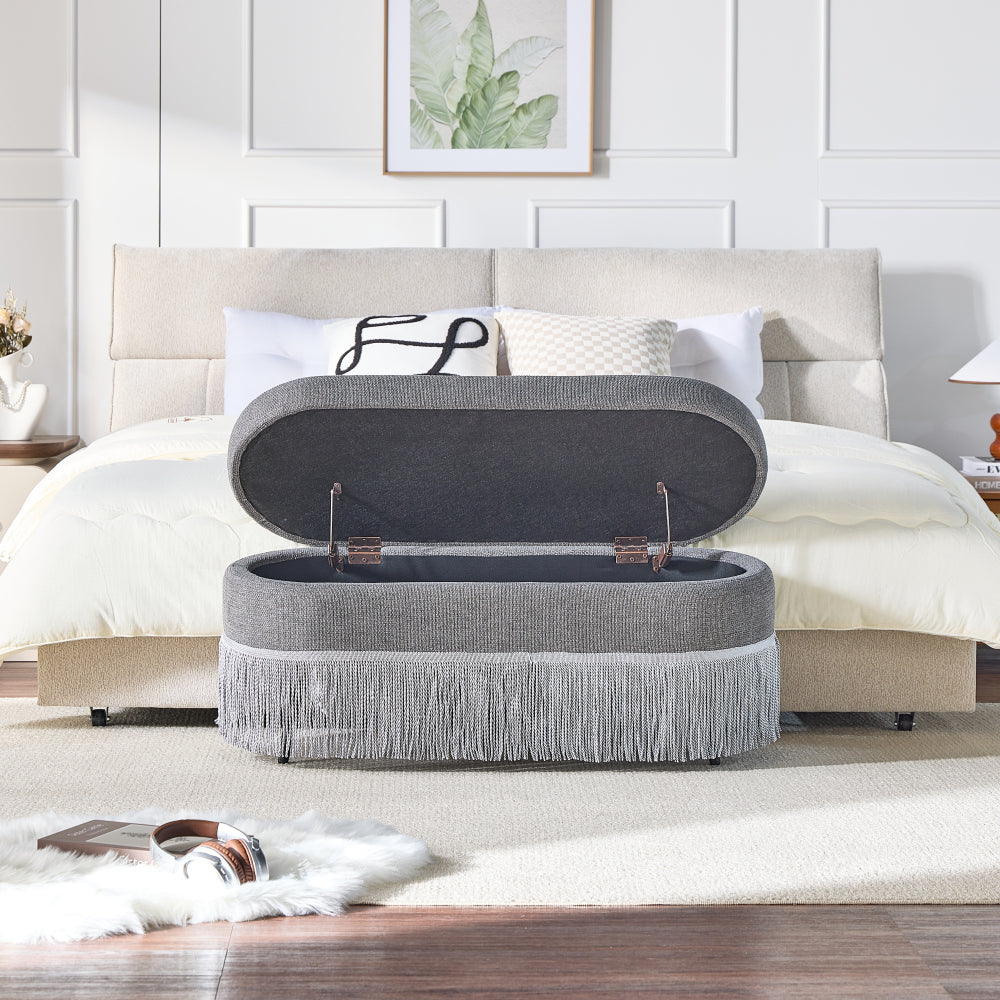Oval Storage Ottoman with Fringe Trim, 39.4" Modern Upholstered Footrest, Lift-Top Lid for Hidden Storage, Multi-Functional Bench for Small Space Living Room or Bedroom, Grey Fabric